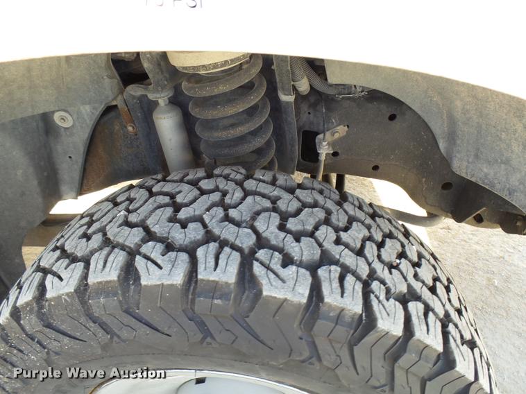 image for item DB2457 2008 Ford F350 Super Duty XL Crew Cab utility bed pickup truck