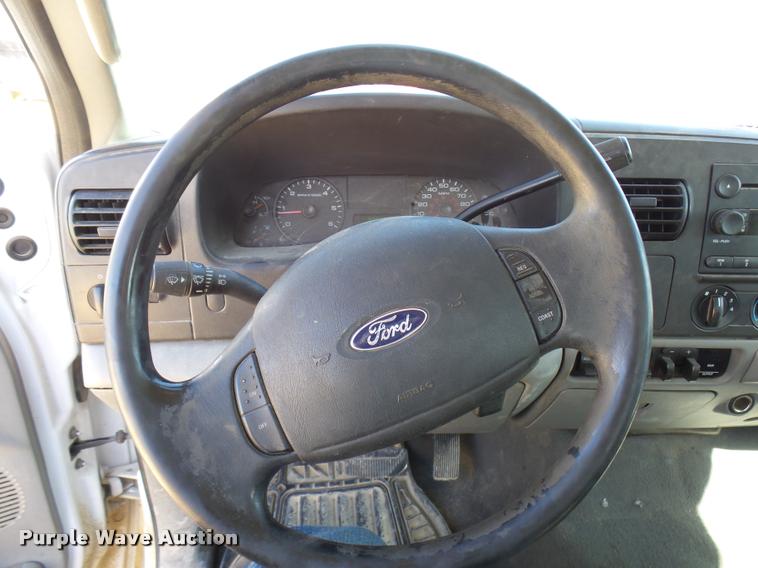 image for item DB2458 2007 Ford F250 Super Duty Crew Cab flatbed pickup truck