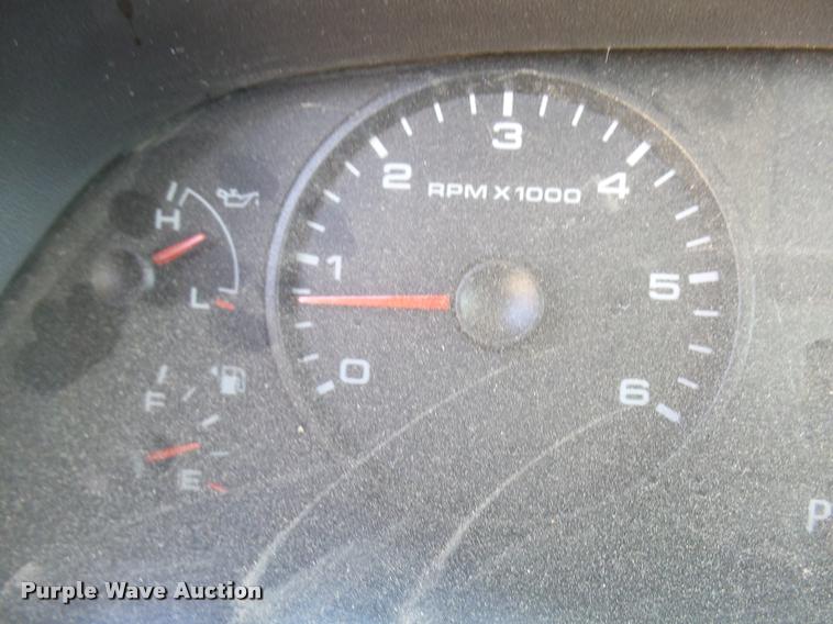 image for item DB2458 2007 Ford F250 Super Duty Crew Cab flatbed pickup truck