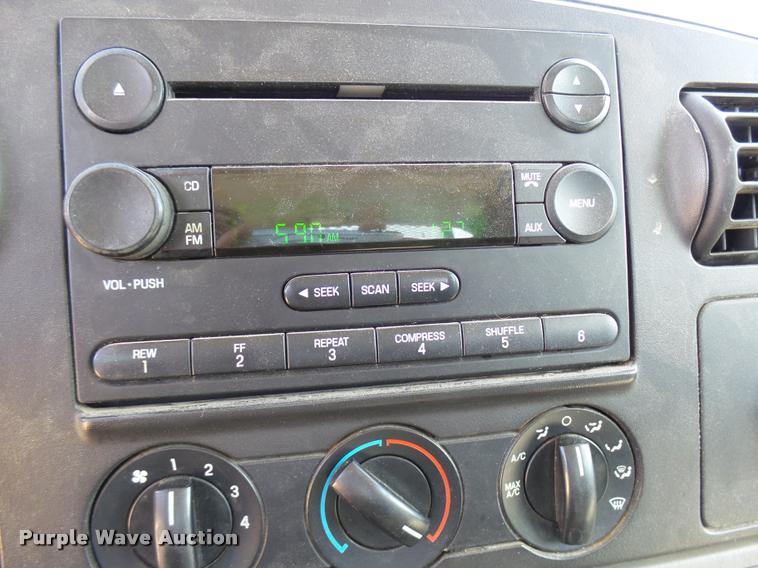 image for item DB2458 2007 Ford F250 Super Duty Crew Cab flatbed pickup truck