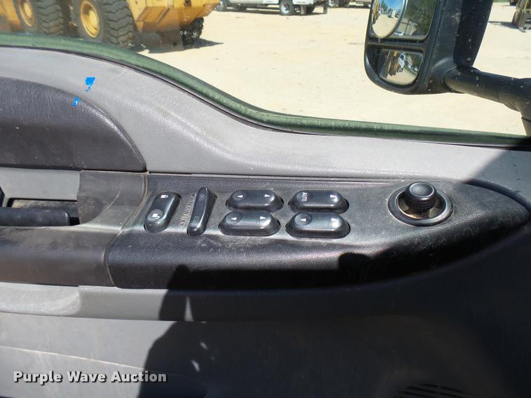 image for item DB2458 2007 Ford F250 Super Duty Crew Cab flatbed pickup truck