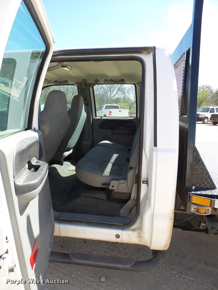 image for item DB2458 2007 Ford F250 Super Duty Crew Cab flatbed pickup truck