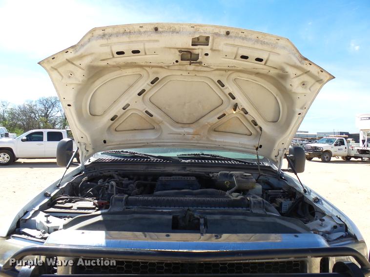 image for item DB2458 2007 Ford F250 Super Duty Crew Cab flatbed pickup truck