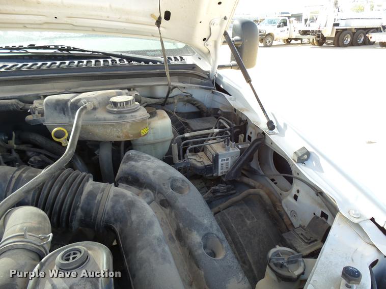 image for item DB2458 2007 Ford F250 Super Duty Crew Cab flatbed pickup truck