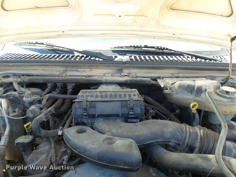 image for item DB2458 2007 Ford F250 Super Duty Crew Cab flatbed pickup truck