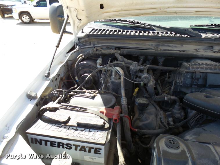 image for item DB2458 2007 Ford F250 Super Duty Crew Cab flatbed pickup truck