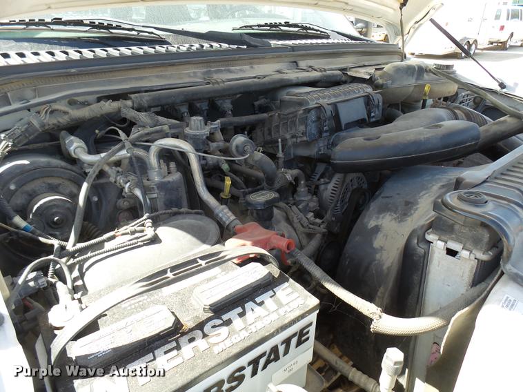 image for item DB2458 2007 Ford F250 Super Duty Crew Cab flatbed pickup truck