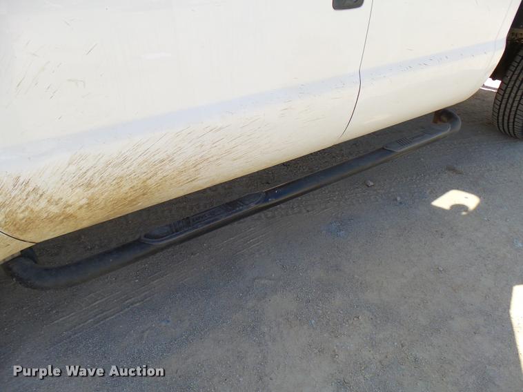 image for item DB2458 2007 Ford F250 Super Duty Crew Cab flatbed pickup truck