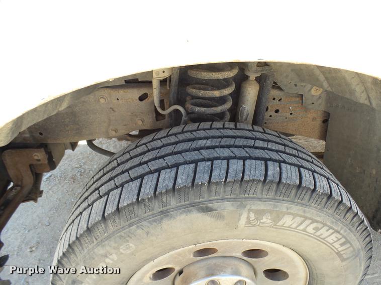 image for item DB2458 2007 Ford F250 Super Duty Crew Cab flatbed pickup truck