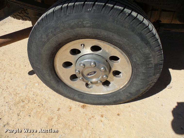 image for item DB2458 2007 Ford F250 Super Duty Crew Cab flatbed pickup truck