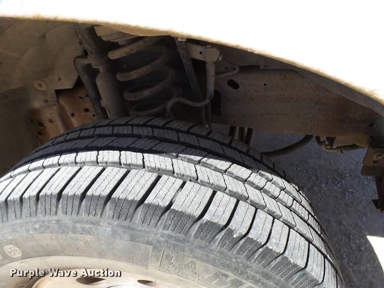 image for item DB2458 2007 Ford F250 Super Duty Crew Cab flatbed pickup truck