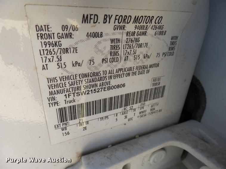 image for item DB2458 2007 Ford F250 Super Duty Crew Cab flatbed pickup truck