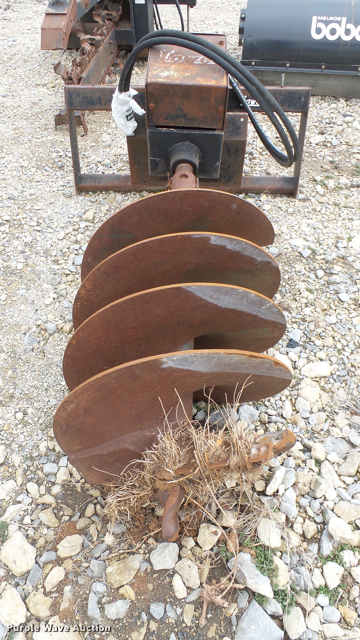 Lowe skid steer auger in Benton, KS Item CB9580 sold Purple Wave