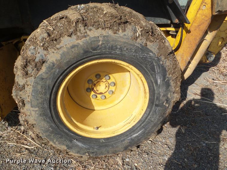 image for item DA5223 1997 John Deere 310E backhoe