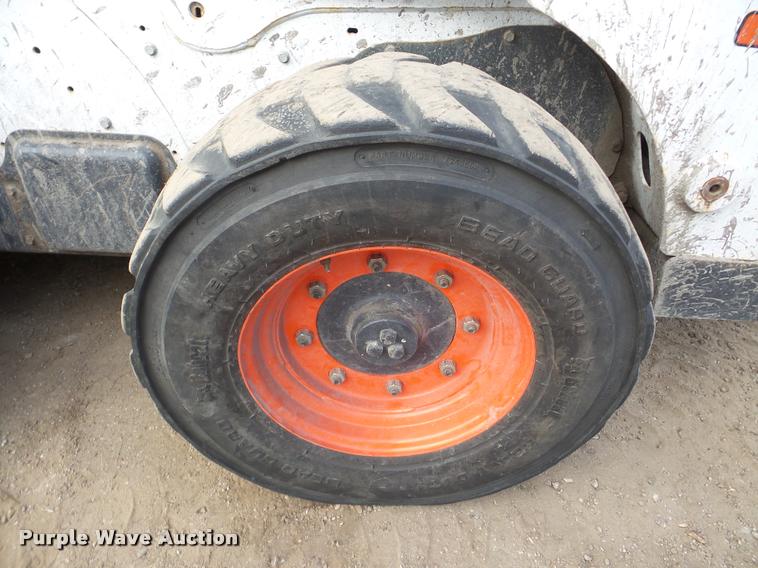 image for item DA7302 2014 Bobcat S750 skid steer