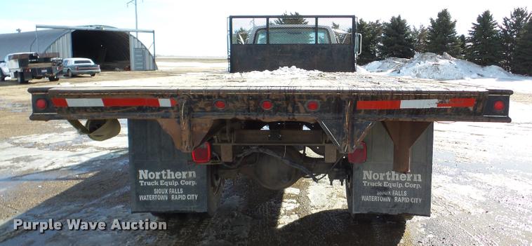 image for item DA7326 1999 Ford F800 dump flatbed truck