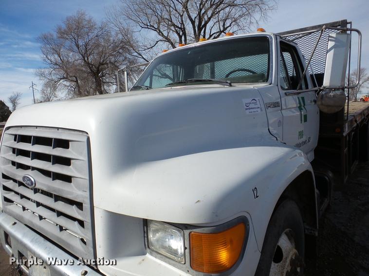 image for item DA7326 1999 Ford F800 dump flatbed truck