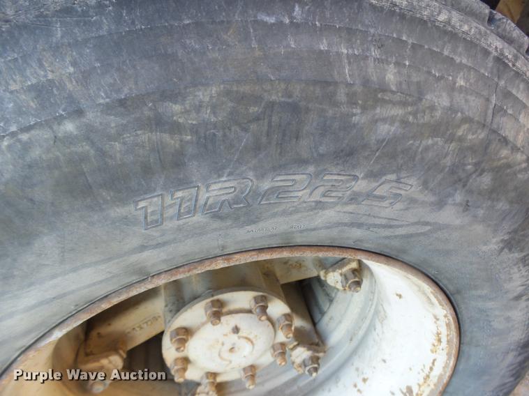 image for item DB1287 1996 Freightliner FL80 mixer truck