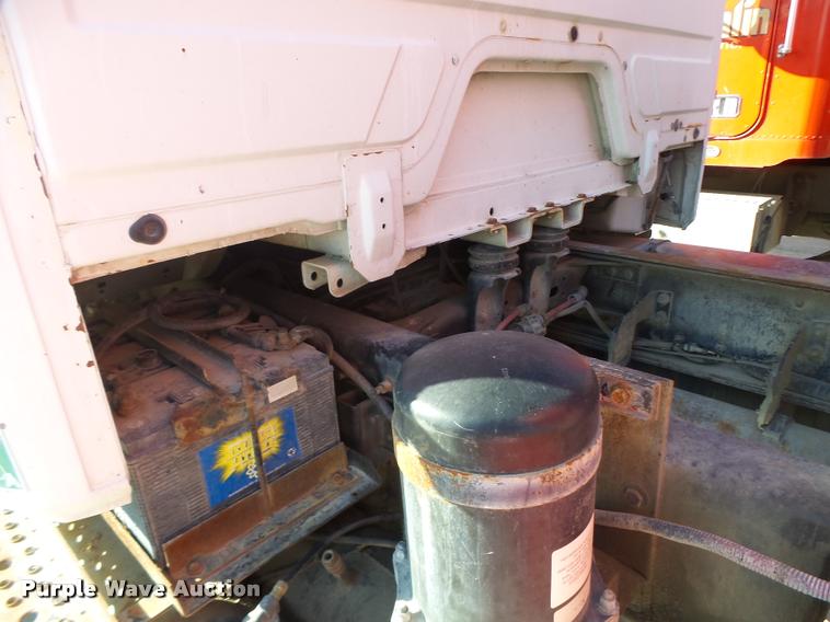 image for item DB1287 1996 Freightliner FL80 mixer truck