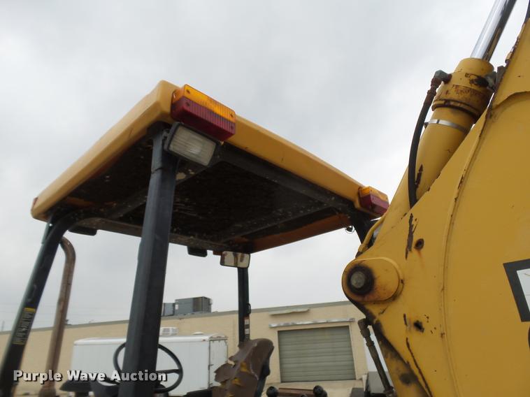 image for item DE9532 1998 John Deere 310E backhoe