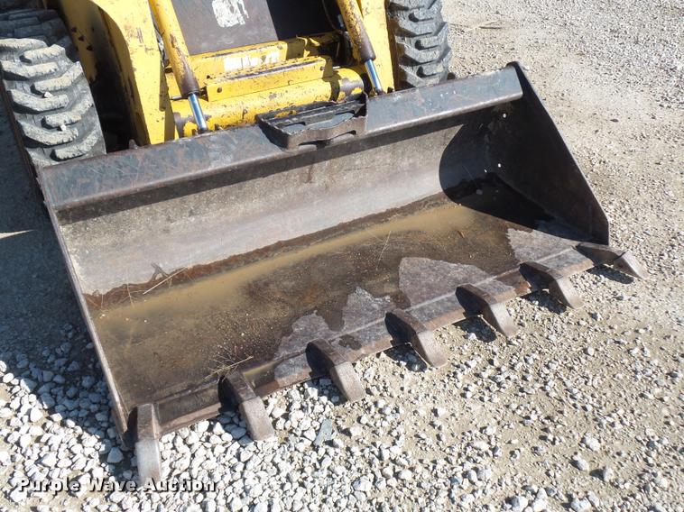 image for item J1581 1999 John Deere 240 skid steer