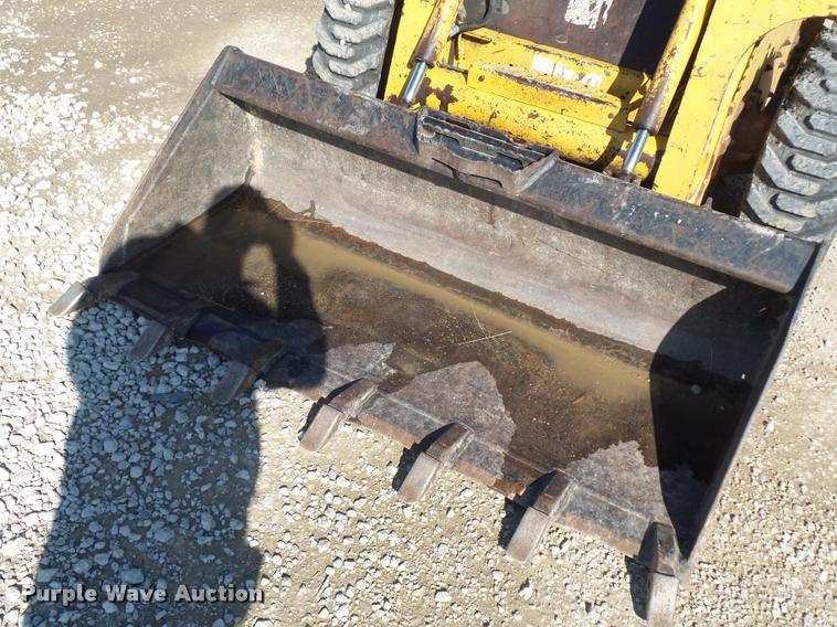 image for item J1581 1999 John Deere 240 skid steer