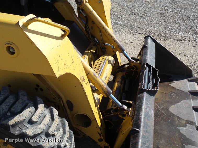 image for item J1581 1999 John Deere 240 skid steer