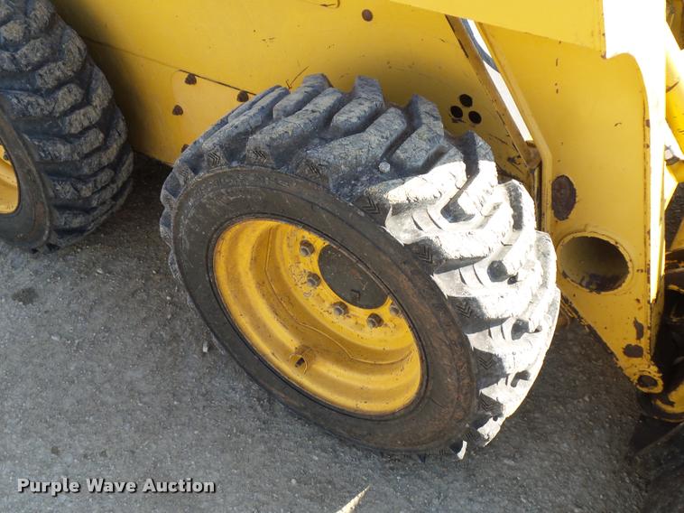 image for item J1581 1999 John Deere 240 skid steer