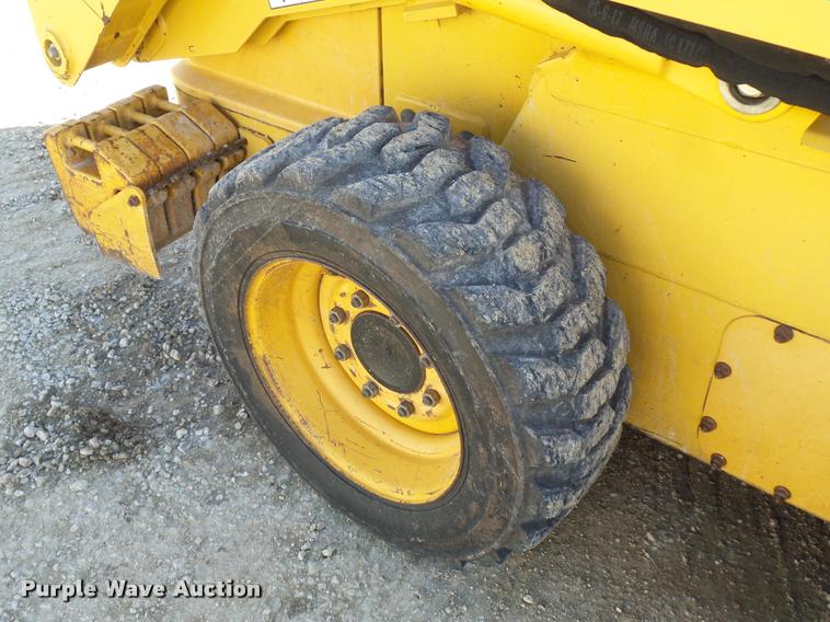 image for item J1581 1999 John Deere 240 skid steer