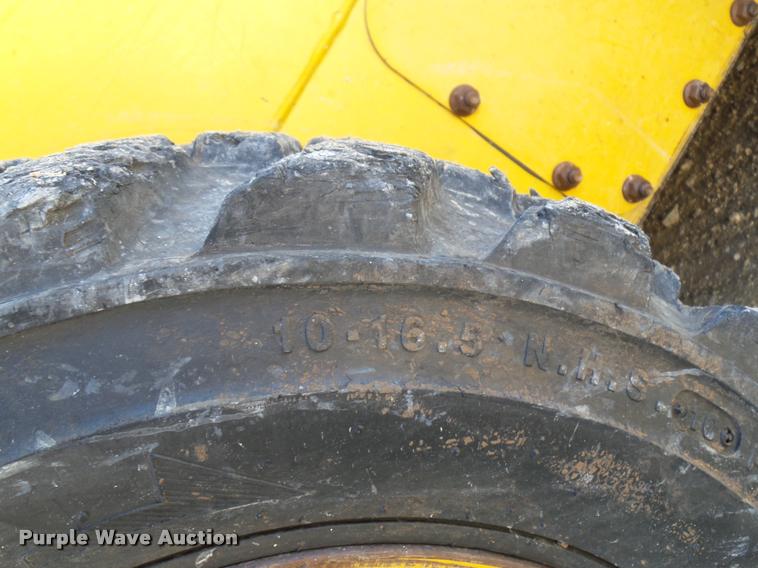 image for item J1581 1999 John Deere 240 skid steer