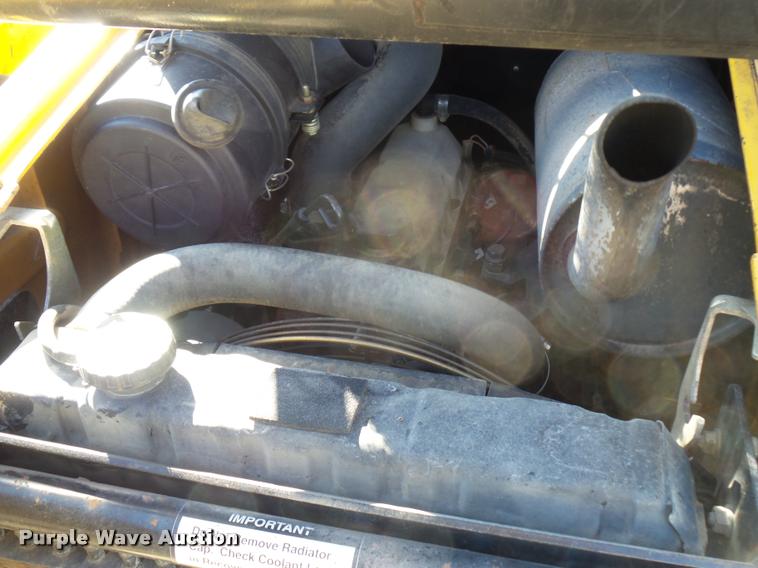 image for item J1581 1999 John Deere 240 skid steer