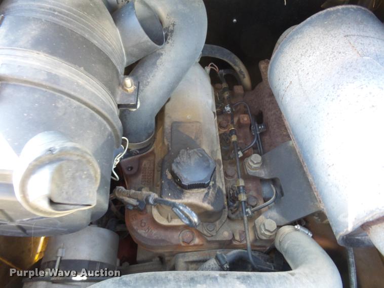 image for item J1581 1999 John Deere 240 skid steer