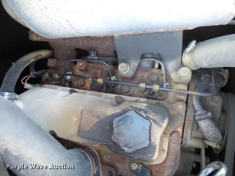 image for item J1581 1999 John Deere 240 skid steer