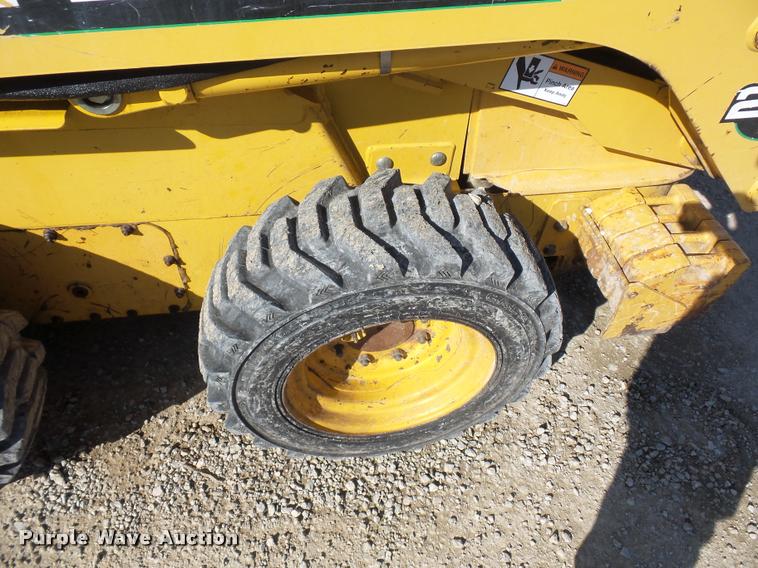 image for item J1581 1999 John Deere 240 skid steer