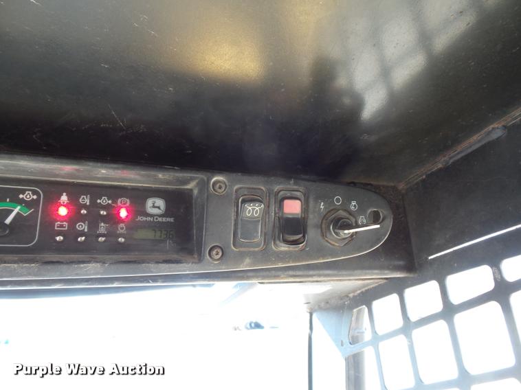 image for item J1581 1999 John Deere 240 skid steer