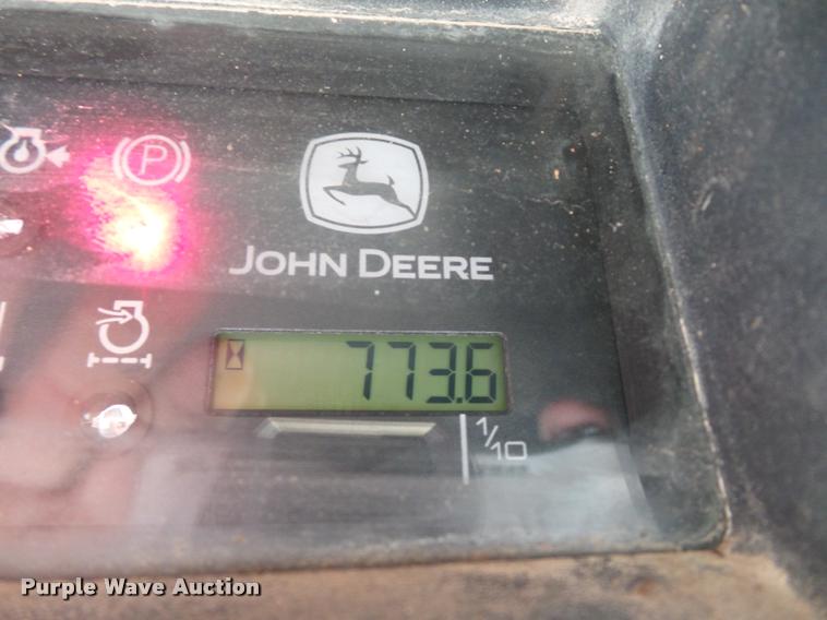 image for item J1581 1999 John Deere 240 skid steer