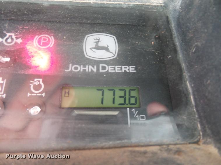 image for item J1581 1999 John Deere 240 skid steer