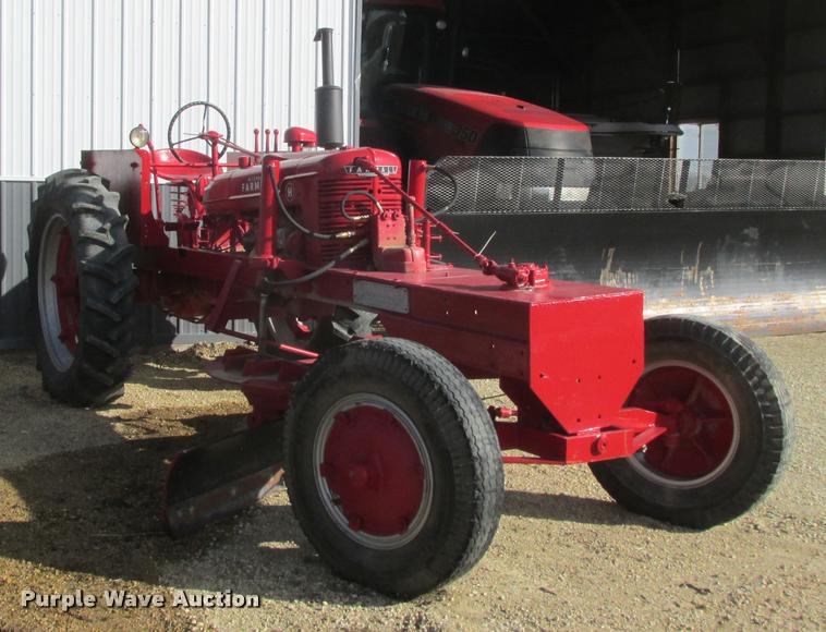 image for item K6163 Mccormick Farmall M30 motor grader