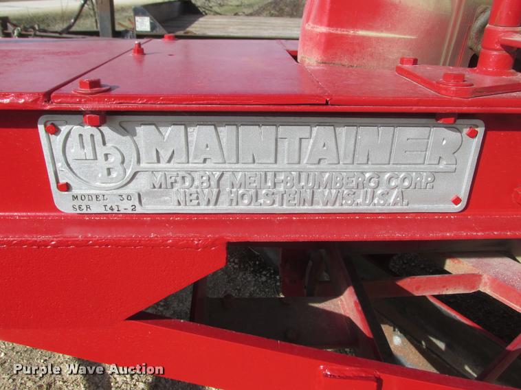 image for item K6163 Mccormick Farmall M30 motor grader