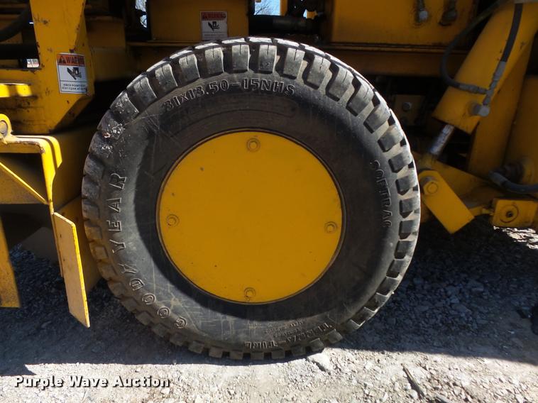 image for item K7699 1995 Puckett Bros 850SF curb machine