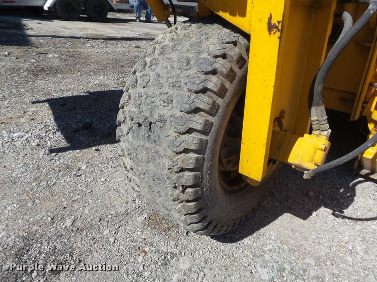 image for item K7699 1995 Puckett Bros 850SF curb machine