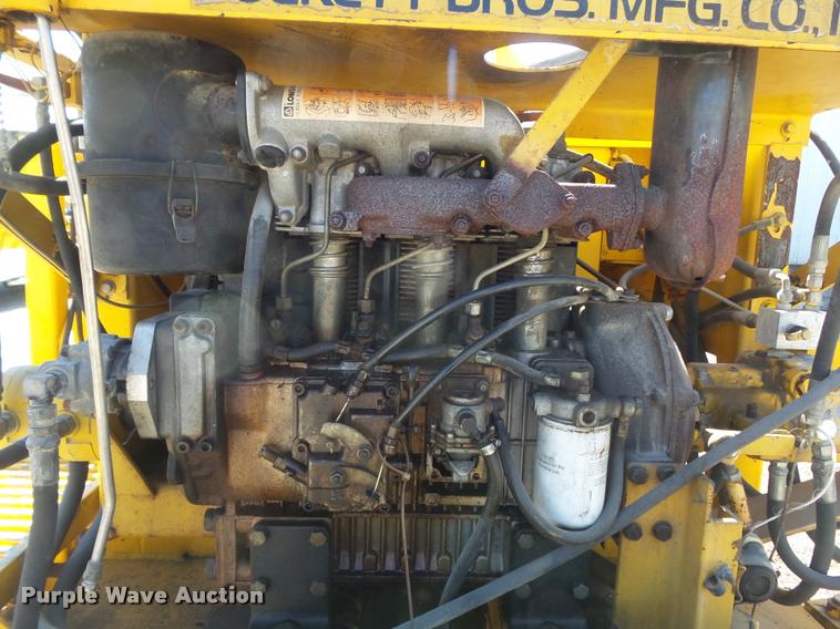 image for item K7699 1995 Puckett Bros 850SF curb machine