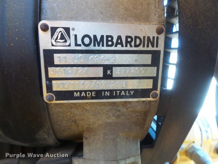 image for item K7699 1995 Puckett Bros 850SF curb machine