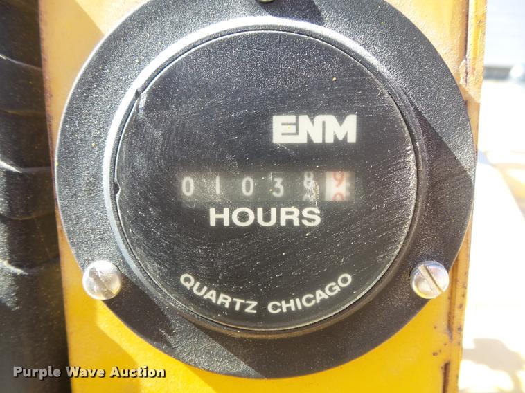 image for item K7699 1995 Puckett Bros 850SF curb machine