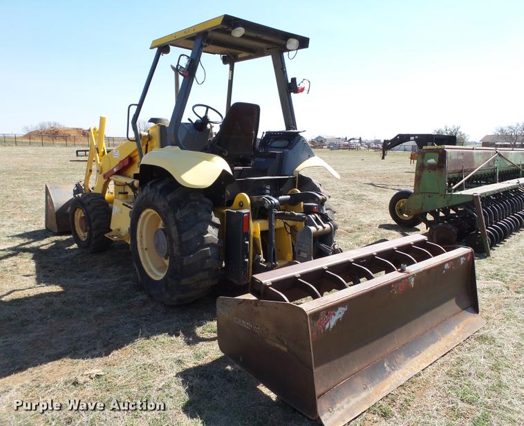 image for item L1602 2005 New Holland LV80 loader tractor
