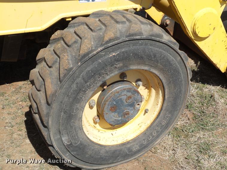 image for item L1602 2005 New Holland LV80 loader tractor