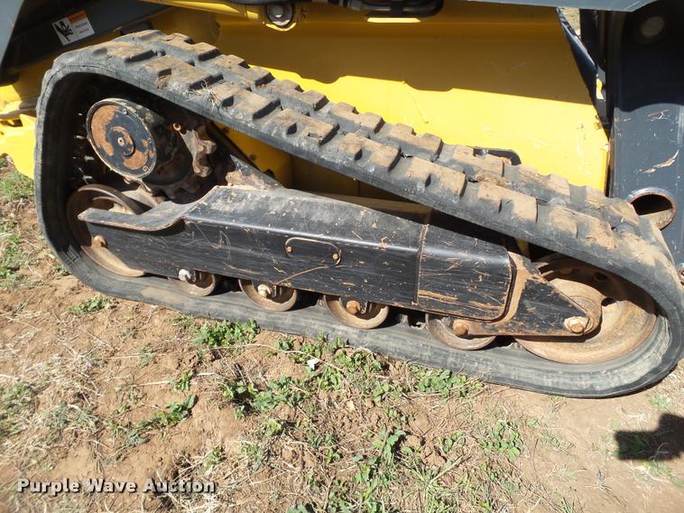 image for item L1616 2010 John Deere 319D skid steer