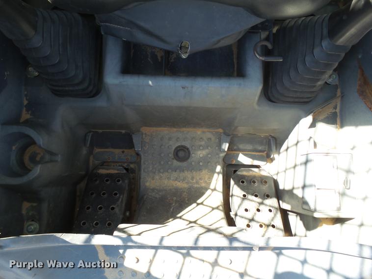 image for item L1616 2010 John Deere 319D skid steer