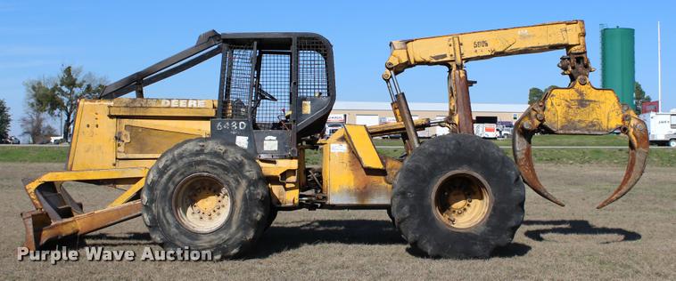 image for item L3028 1985 John Deere 648D skidder