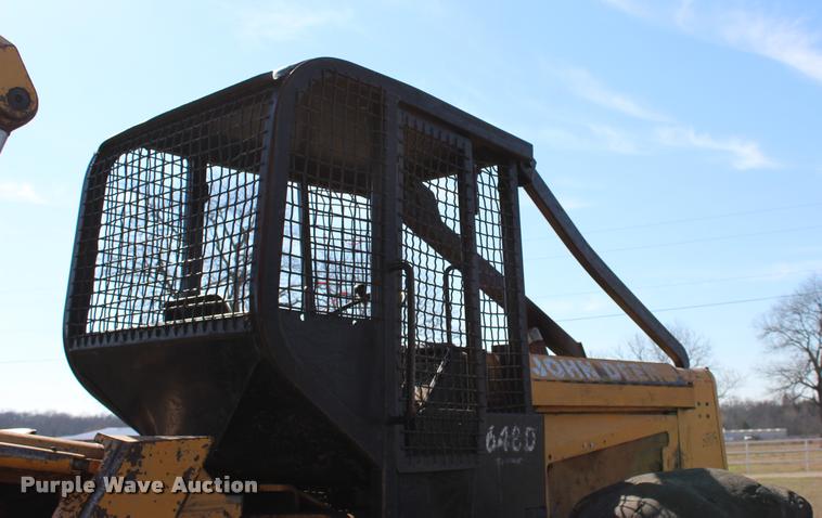 image for item L3028 1985 John Deere 648D skidder